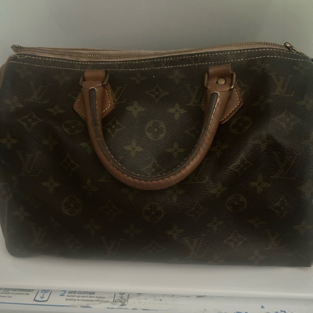 Sold Louis Vuitton Classic Brown Speedy authentic with letter of authenticity